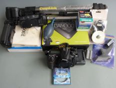Nikon D300 DSLR camera body in original box with two battery holder bases, charger, accessories