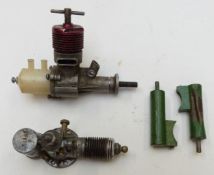 ME Heron vintage diesel compression ignition model aircraft engine with twin exhausts together