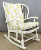 An upholstered rocking chair,  H90cm