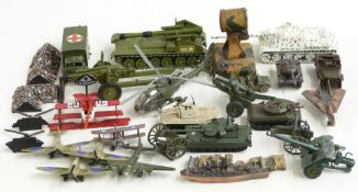 Twenty-five Dinky Toys, Britains, Solido and similar diecast model military vehicles together with
