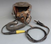 Two flying helmets both with Ministry marks, one with radio and oxygen fittings, together with an
