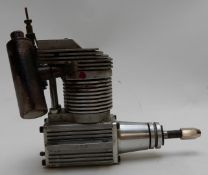 Laser four stroke model aircraft or similar petrol engine, stamped to side JFM, height 11cm