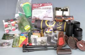 A collection of gun and shooting accessories including bipod, speedloader, BKL scope mounts,