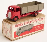 Dinky Supertoys diecast model Guy 4-ton Lorry with red cab, chassis and hubs and fawn bed, 511, in