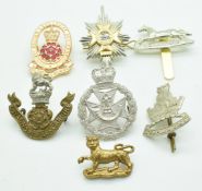 Six British Army metal badges including hallmarked silver Officers Light Infantry, Yorkshire