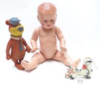 Three dolls and figures comprising Moko diecast Muffin The Mule puppet, bendy Yogi bear and a