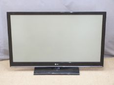 Large LG flatscreen television and remote, W117 x H79cm