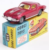 Corgi Toys diecast model Chevrolet Corvette Sting Ray with metallic red body and lemon interior,