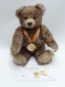 Steiff Danbury Mint limited edition 2009 Teddy bear with tipped mohair growler and medal, 30cm tall,