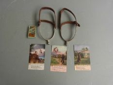 WW1 era 'The Trail That Leads to Home' postcards, a pair of cavalry stirrups by Stallwood