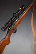 BRNO Model 2 .22 bolt-action rifle with chequered semi-pistol grip, magazine, leather sling,