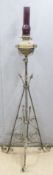 Arts and Crafts wrought iron and brass extendable oil lamp, H165cm