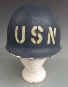 Military helmet painted with USN to front and Pearl Harbour references