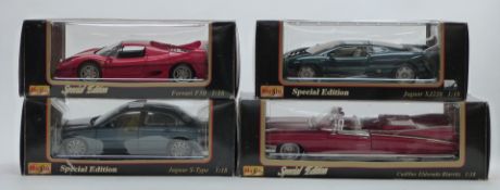Four Maisto Special Edition 1:18 scale diecast model cars comprising Ferrari F50 31823, Jaguar S