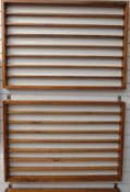 A set of three diecast model or train display shelf units, each 61x88cm, together with a similar
