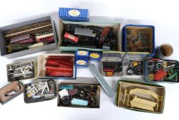 A collection of Hornby Dublo 00 gauge rolling stock and accessories including coaches, tankers,
