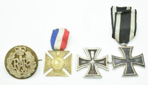 Two German Iron Crosses, one WW1 the other WW2, together with a Queen Victoria Diamond Jubilee Cross