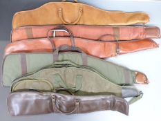 Six padded and wool or fleece lined shotgun or rifle gun slips, all with shoulder straps.
