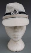 Japanese Navy officer's cap with anchor motif and two black stripes.