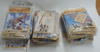 Eighty-five issues of Build The Red Baron's Fighter Plane, all with parts in original packaging.
