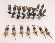 Twenty-seven Britains and similar lead model soldiers including Army infantry