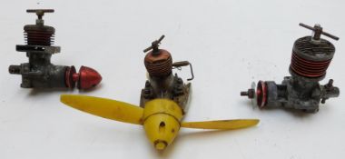 Two vintage ED 246 diesel compression ignition model aircraft engines and a FROG 149 engine