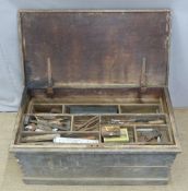 A 19thC pine toolbox with fitted sliding drawer, vintage woodworking tools including planes,
