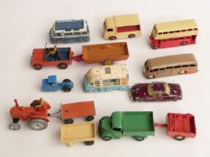 Twelve Corgi and Dinky Toys diecast model vehicles including buses, Field Marshal tractor,