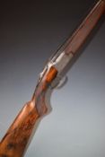 Browning B25 12 bore over and under ejector shotgun custom built and engraved by A M Brown with