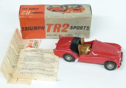 Victory Models 1:18 scale electric model Triumph TR2 Sports Car with red body and tan interior, in