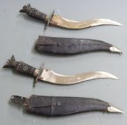 Indian souvenir daggers with 'Made in India' on 21cm blades, with sheaths