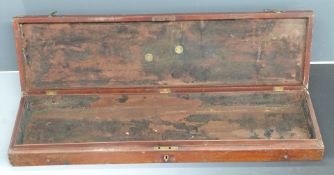 A wooden muzzle loading gun case with brass carry handle and clips, 85.5x24x8cm.