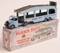 Two Dinky Toys diecast model vehicles Pullmore Car Transporter 582 and Army Scout Car 673 both in