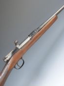 Unnamed .410 bolt-action shotgun with chequered grip and 24.5 inch barrel, overall length 111cm,