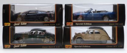 Four Maisto 1:18 scale Special Edition diecast model cars Jaguar Mark II 31833, XK831836 and XJ220