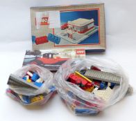 A collection of Lego including two sets Lego System Esso Filling Station (1958) and 1913 Cadillac (