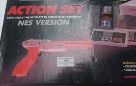Nintendo Entertainment System (NES) Version Action Set video games console, in original box.