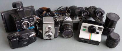 Cameras, binoculars and lenses to include Praktica MTL3 camera with Pentacon 2.8/29, 2.8/135 and 1.