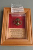 British Army WW1 25th Royal Fusiliers Frontiersmen cap badge, framed and mounted