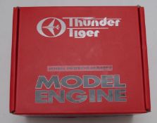 Thunder Tiger GP42 model aircraft glow engine in box, together with a GP7 engine and an Irvine 25