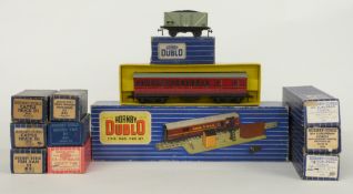 Twelve Hornby Dublo 00 gauge coaches, wagons, trucks and vans including T.P.P. Mail Van Set,