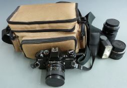 Praktica BC1 SLR camera with Carl Zeiss 1:2.4 f=35mm, 1:1.8 f=50mm and 4-5.6/70-210 lenses, flashgun