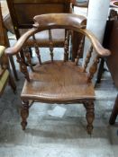 A 19thC elm seated smoker's bow chair, H78cm