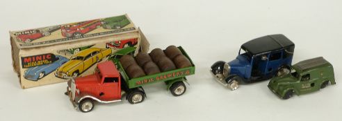 Three Tri-ang Minic clockwork model toys comprising Tri-ang Brewery Articulated Lorry and Trailer