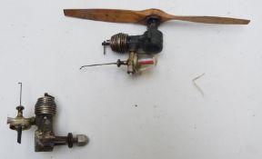 Two Mills or similar diesel compression ignition model aircraft engines, one marked 51 and 164 to