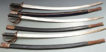 Three Indian souvenir swords with 'Made in India' to 77cm blades, with scabbards