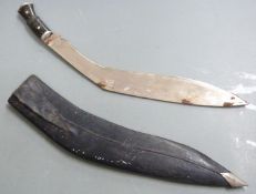 Kukri knife with crude etching to 40cm blade, in leather sheath