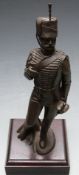 Figure of a Royal Gloucestershire Hussars Senior NCO on plinth, H36cm