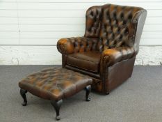 Chesterfield wing back brown leather armchair, W85 x H90xm and footstool