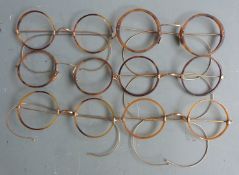Six pairs of faux tortoiseshell and rolled gold spectacles circa 1920s, one marked Elite to nose